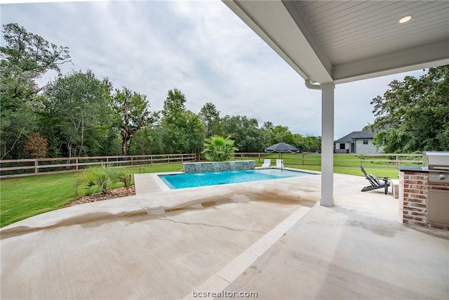 view of pool with a patio area, pool water feature, a yard, and a grill