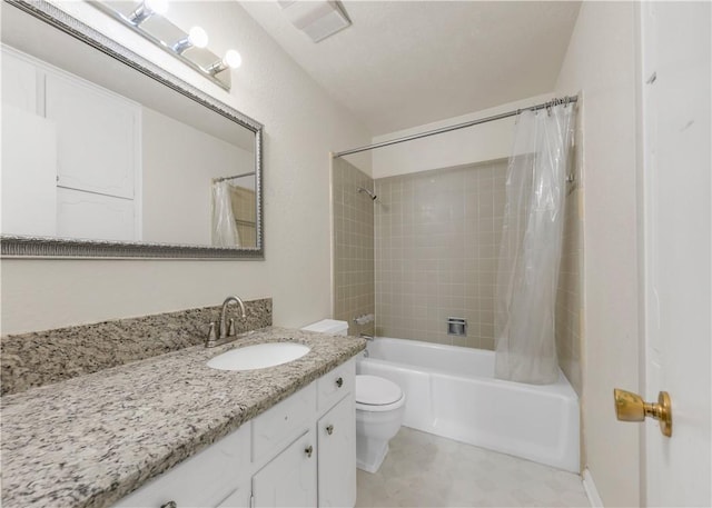 full bathroom featuring vanity, toilet, and shower / bath combo with shower curtain