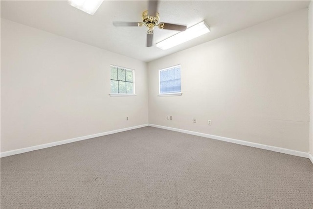 unfurnished room featuring carpet and ceiling fan