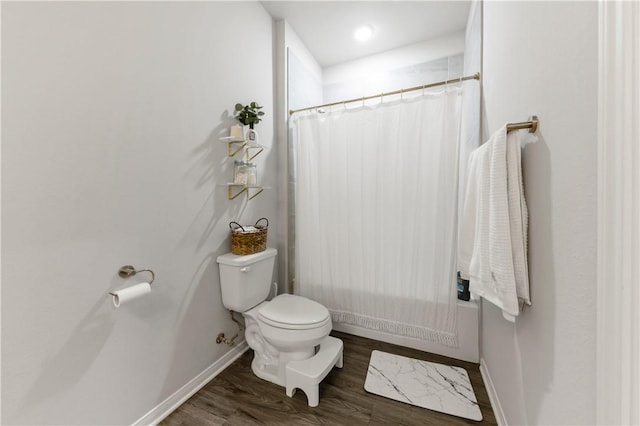 1326 Prairie Dr Unit 113, Bryan, TX 77803 - bathroom with toilet, wood finished floors, and baseboards