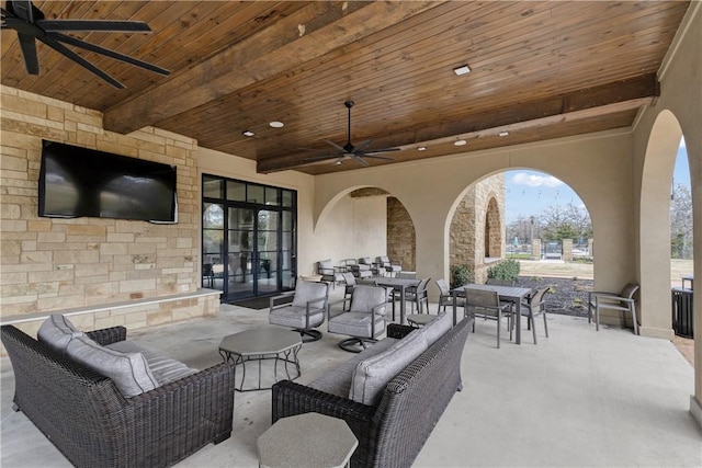 view of patio / terrace featuring a ceiling fan, outdoor dining area, and outdoor lounge area