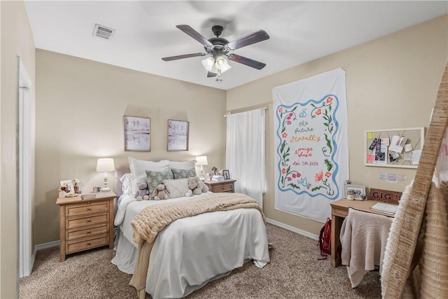 1611 Park Pl, College Station, TX 77840 - carpeted bedroom featuring baseboards and a ceiling fan