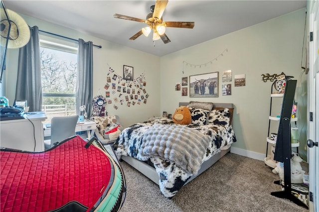 bedroom with ceiling fan and carpet