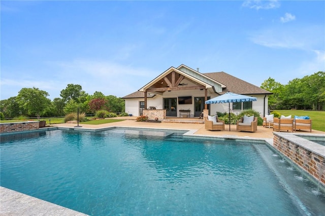 outdoor pool with an exterior structure, an outdoor living space, and a patio