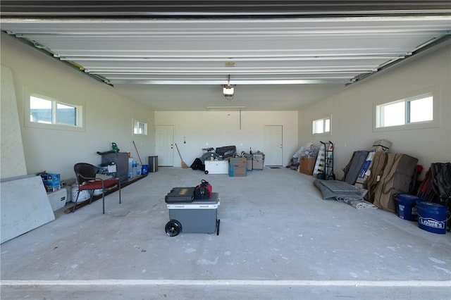 7532 Marys Way, Bryan, TX 77808 - garage featuring a garage door opener