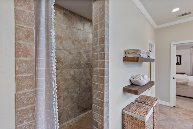 bathroom featuring visible vents, ensuite bathroom, ornamental molding, tiled shower, and baseboards