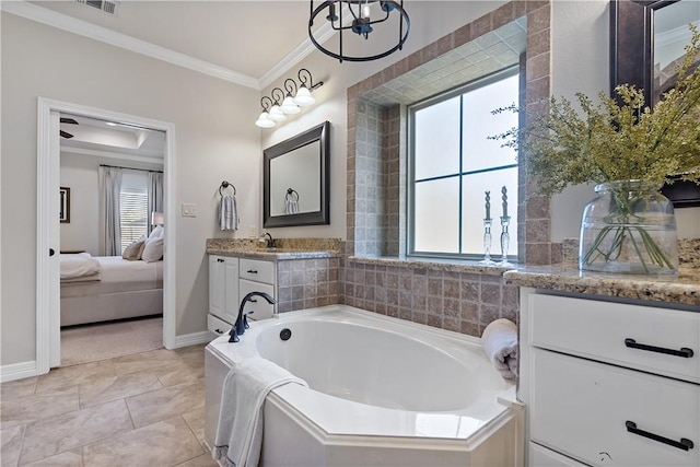 ensuite bathroom featuring ensuite bath, tile patterned floors, crown molding, vanity, and a bath