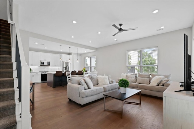 273 Estates Cir, College Station, TX 77840 - living area featuring stairs, plenty of natural light, a ceiling fan, wood finished floors, and recessed lighting