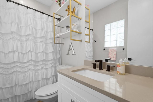 273 Estates Cir, College Station, TX 77840 - bathroom featuring vanity, toilet, and shower / bath combination with curtain