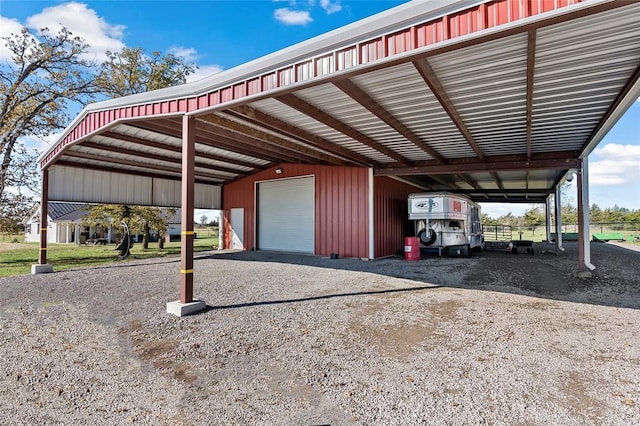 view of parking with a garage