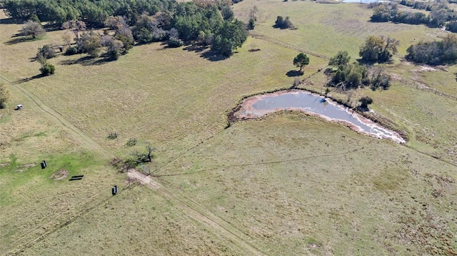 drone / aerial view with a rural view and a water view