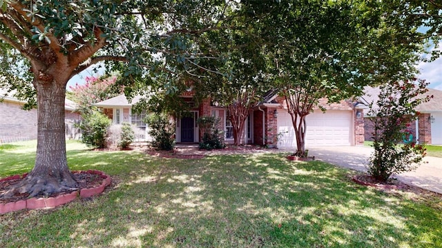 obstructed view of property featuring a garage and a front lawn