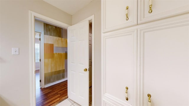 bathroom with hardwood / wood-style flooring