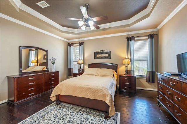 4413 Hearst Ct, College Station, TX 77845 - bedroom featuring a raised ceiling, dark wood-style floors, ornamental molding, and a ceiling fan