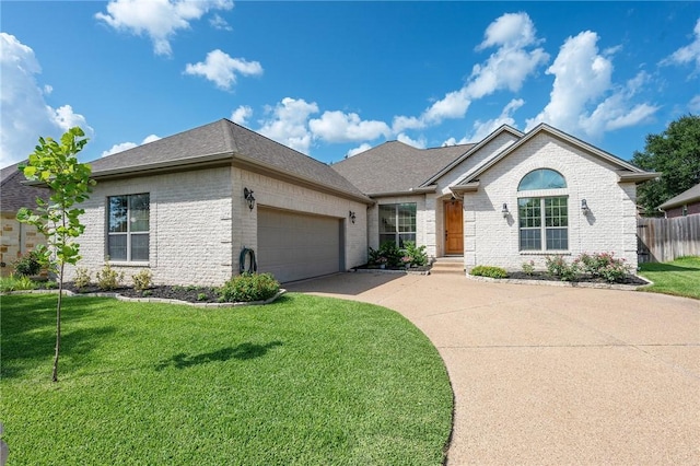 4413 Hearst Ct, College Station, TX 77845 - single story home with brick siding, concrete driveway, an attached garage, and roof with shingles