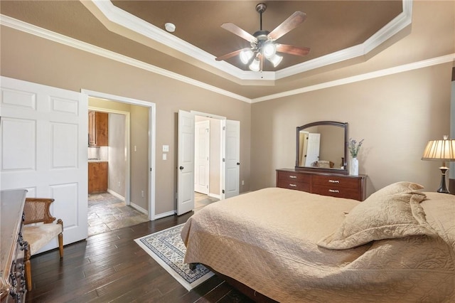 4413 Hearst Ct, College Station, TX 77845 - bedroom featuring a raised ceiling, dark wood-style flooring, ornamental molding, and ceiling fan