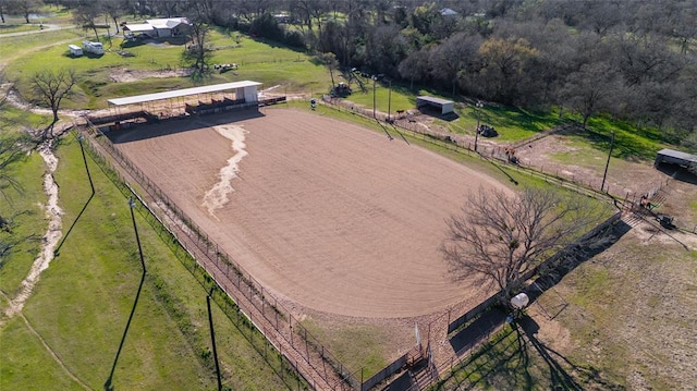 birds eye view of property featuring a rural view