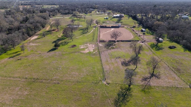 birds eye view of property with a rural view