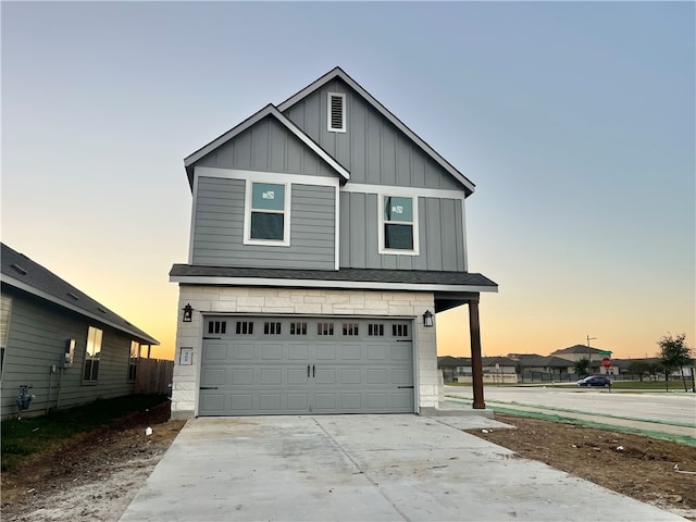 view of front of property featuring a garage