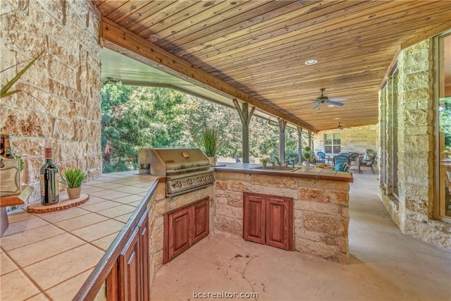 view of patio / terrace with sink, area for grilling, ceiling fan, and a grill