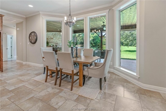 dining space featuring a notable chandelier and ornamental molding