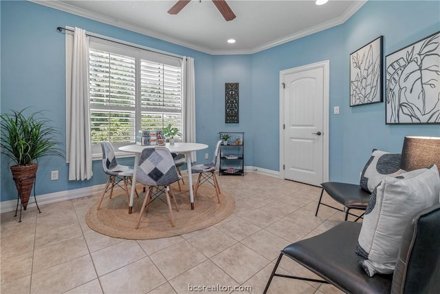 dining room with light tile patterned floors, ceiling fan, and ornamental molding