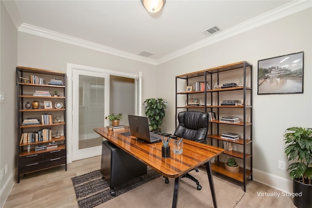 office area featuring light hardwood / wood-style flooring, french doors, and ornamental molding