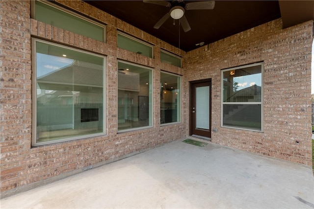 view of patio with ceiling fan