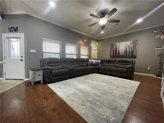 living room featuring crown molding, dark hardwood / wood-style flooring, and ceiling fan