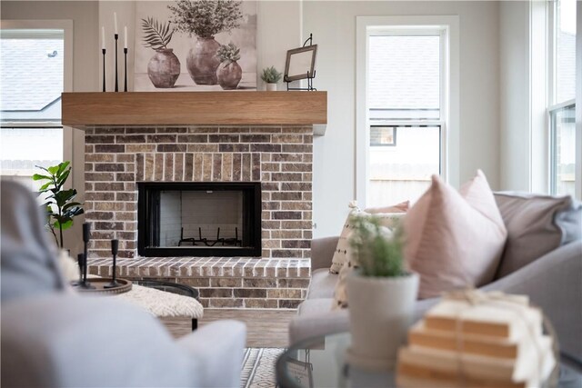 living room featuring a fireplace