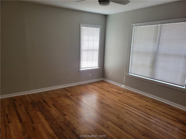 unfurnished room featuring hardwood / wood-style floors and ceiling fan