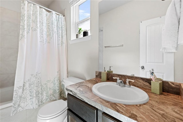 bathroom featuring shower / bath combo, vanity, and toilet