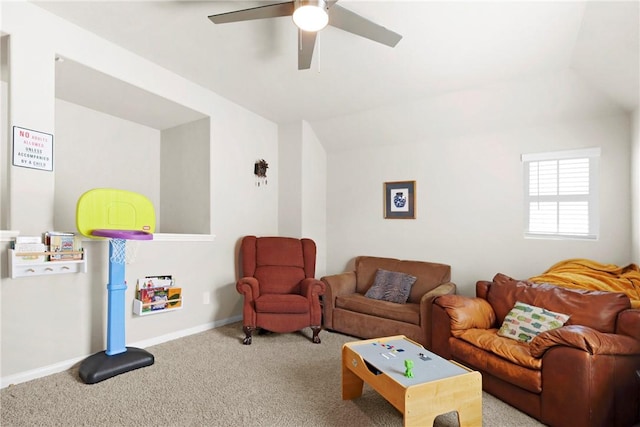 living room featuring a ceiling fan, carpet flooring, lofted ceiling, and baseboards