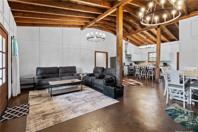3520 Sykora Rd, Fayetteville, TX 78940 - living area featuring high vaulted ceiling, beamed ceiling, finished concrete floors, and a notable chandelier