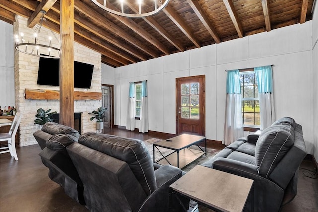 3520 Sykora Rd, Fayetteville, TX 78940 - living room with wood ceiling, concrete flooring, a fireplace, high vaulted ceiling, and beam ceiling