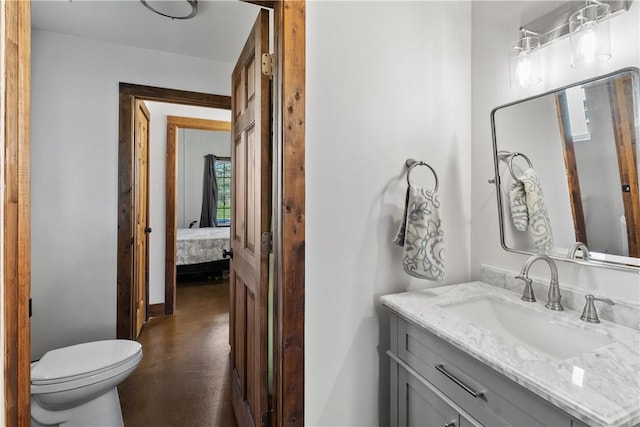 3520 Sykora Rd, Fayetteville, TX 78940 - bathroom with toilet, vanity, and ensuite bathroom