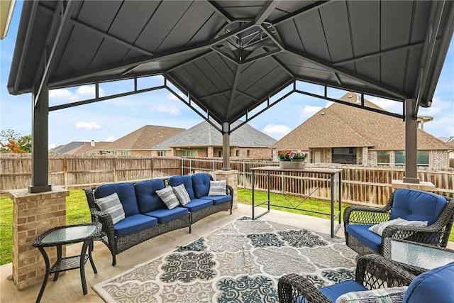 4019 Heru Ct, College Station, TX 77845 - fenced backyard featuring outdoor lounge area and a patio area