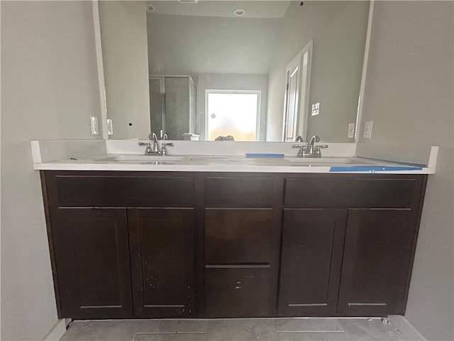 1935 Pinemont View Dr, Bryan, TX 77807 - bathroom with double vanity and a shower stall