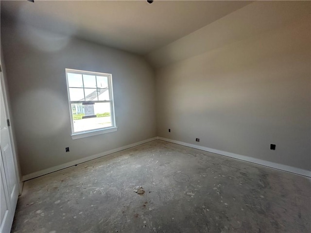 1935 Pinemont View Dr, Bryan, TX 77807 - additional living space with vaulted ceiling, baseboards, and unfinished concrete flooring