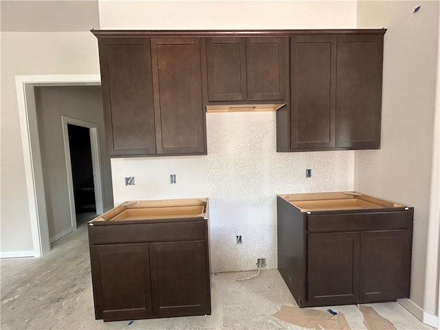 1935 Pinemont View Dr, Bryan, TX 77807 - kitchen featuring dark brown cabinetry