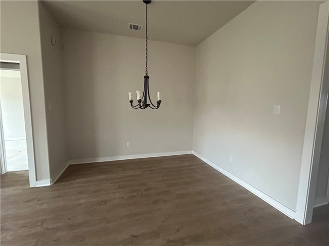 1935 Pinemont View Dr, Bryan, TX 77807 - unfurnished dining area with a chandelier, dark wood finished floors, and vaulted ceiling