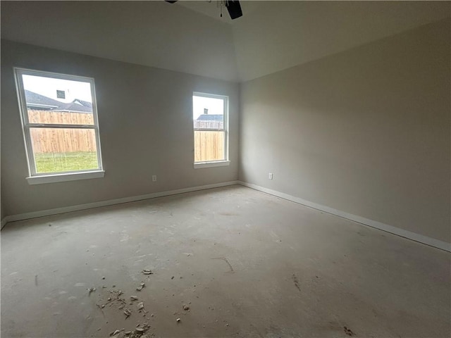 1935 Pinemont View Dr, Bryan, TX 77807 - unfurnished room featuring a ceiling fan, unfinished concrete flooring, and vaulted ceiling