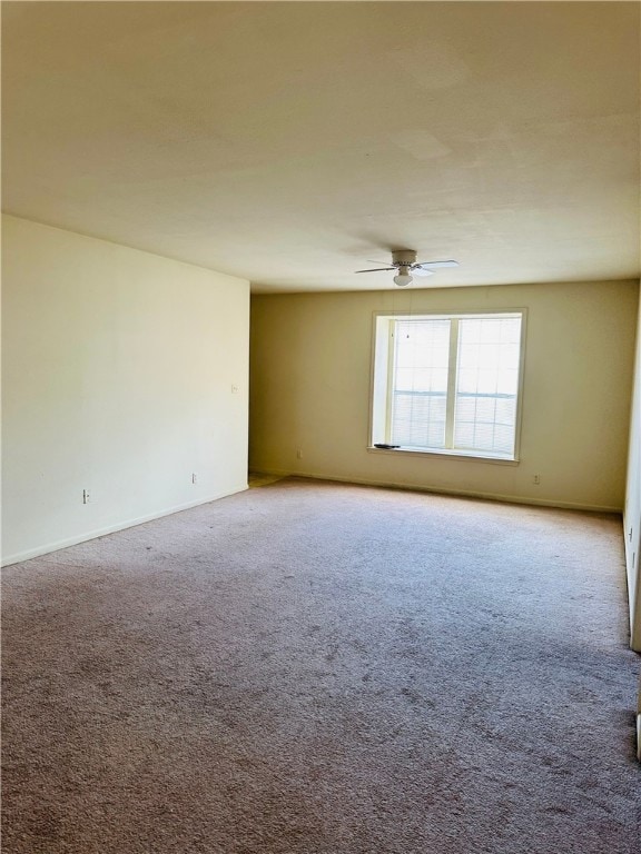 400 Nagle St Unit 304, College Station, TX 77840 - carpeted spare room with a ceiling fan and baseboards