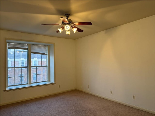400 Nagle St Unit 304, College Station, TX 77840 - spare room featuring ceiling fan and light carpet