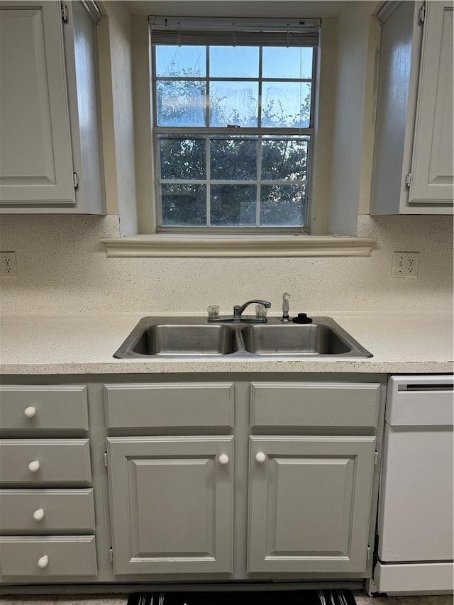 400 Nagle St Unit 304, College Station, TX 77840 - kitchen with white dishwasher, light countertops, and gray cabinets