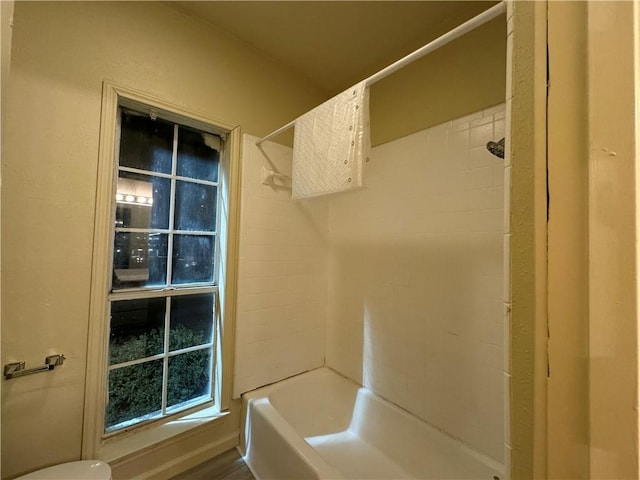 400 Nagle St Unit 304, College Station, TX 77840 - bathroom featuring toilet and shower / tub combination