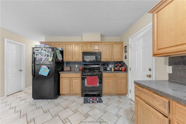 kitchen featuring light brown cabinetry, backsplash, a textured ceiling, and black appliances