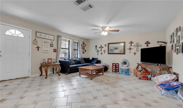 living room with ceiling fan