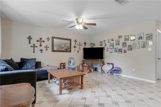 living room featuring ceiling fan