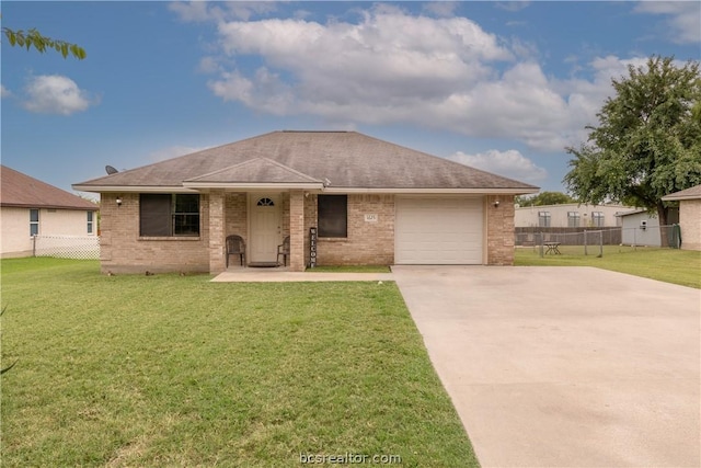 single story home featuring a garage and a front lawn